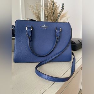 Kate Spade handbag. Long strap and can be used as a shoulder or crossbody bag.
